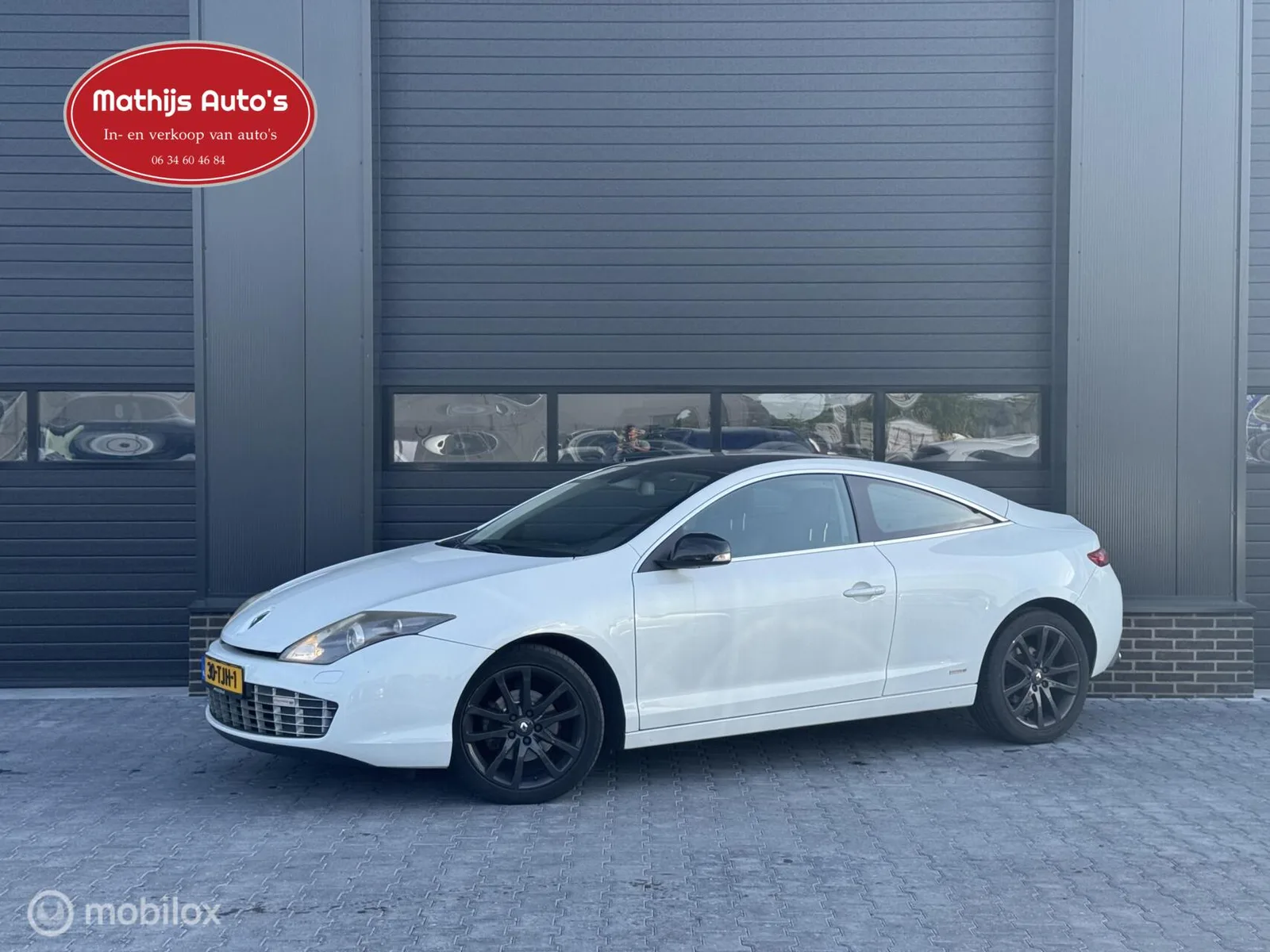 Renault Laguna (2012) — foto 1