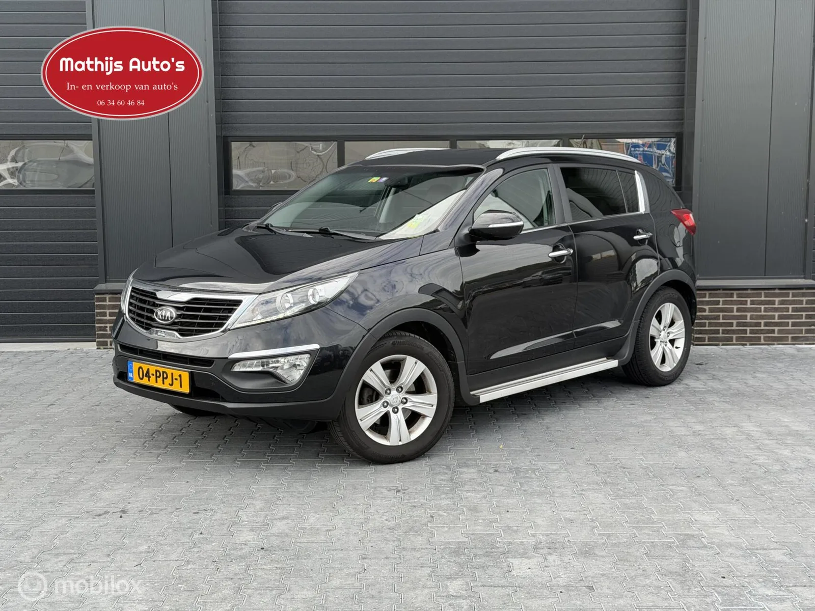 Kia Sportage (2011) — foto 1
