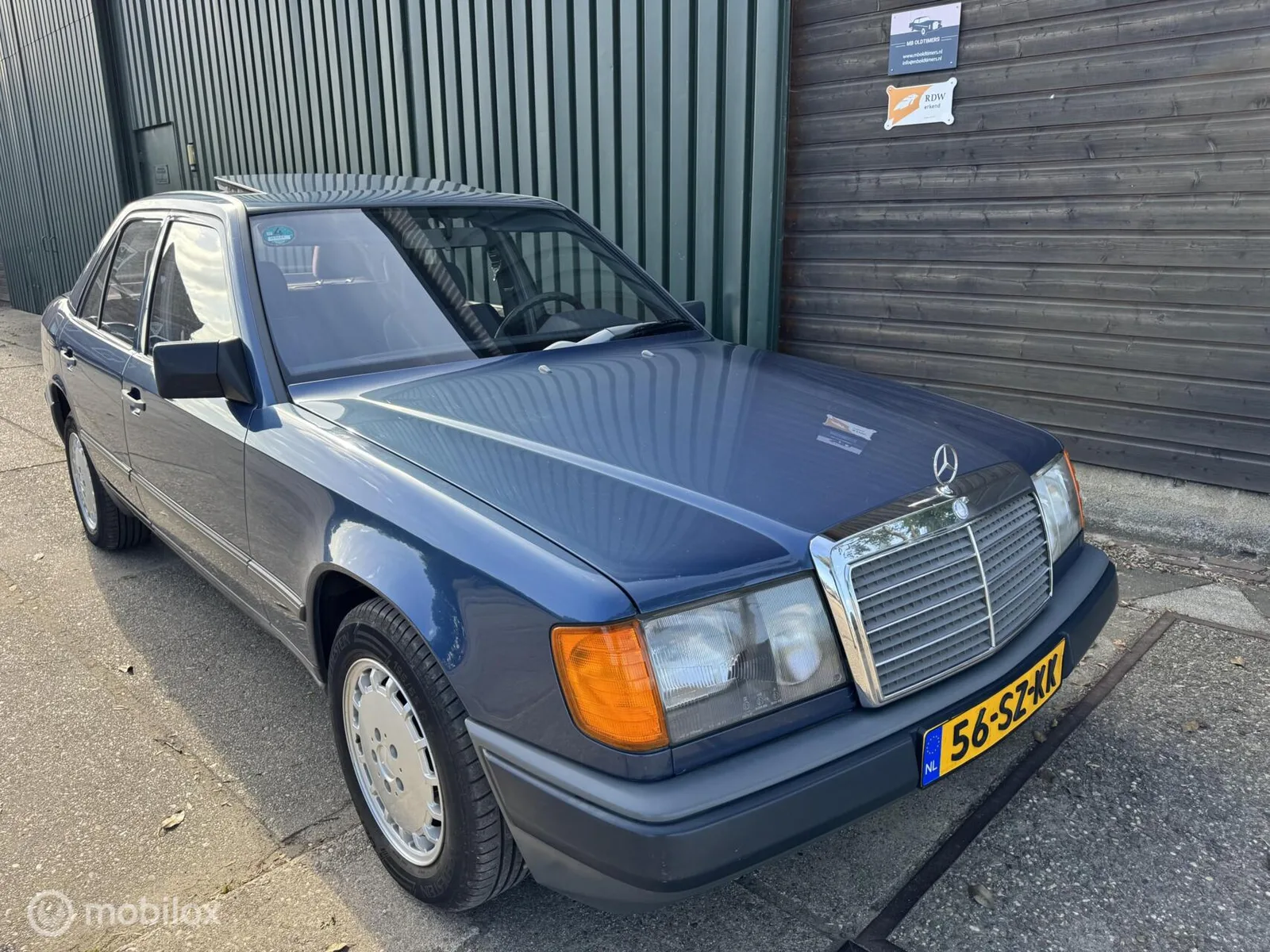 Mercedes-Benz 200-Serie (1988) — foto 1