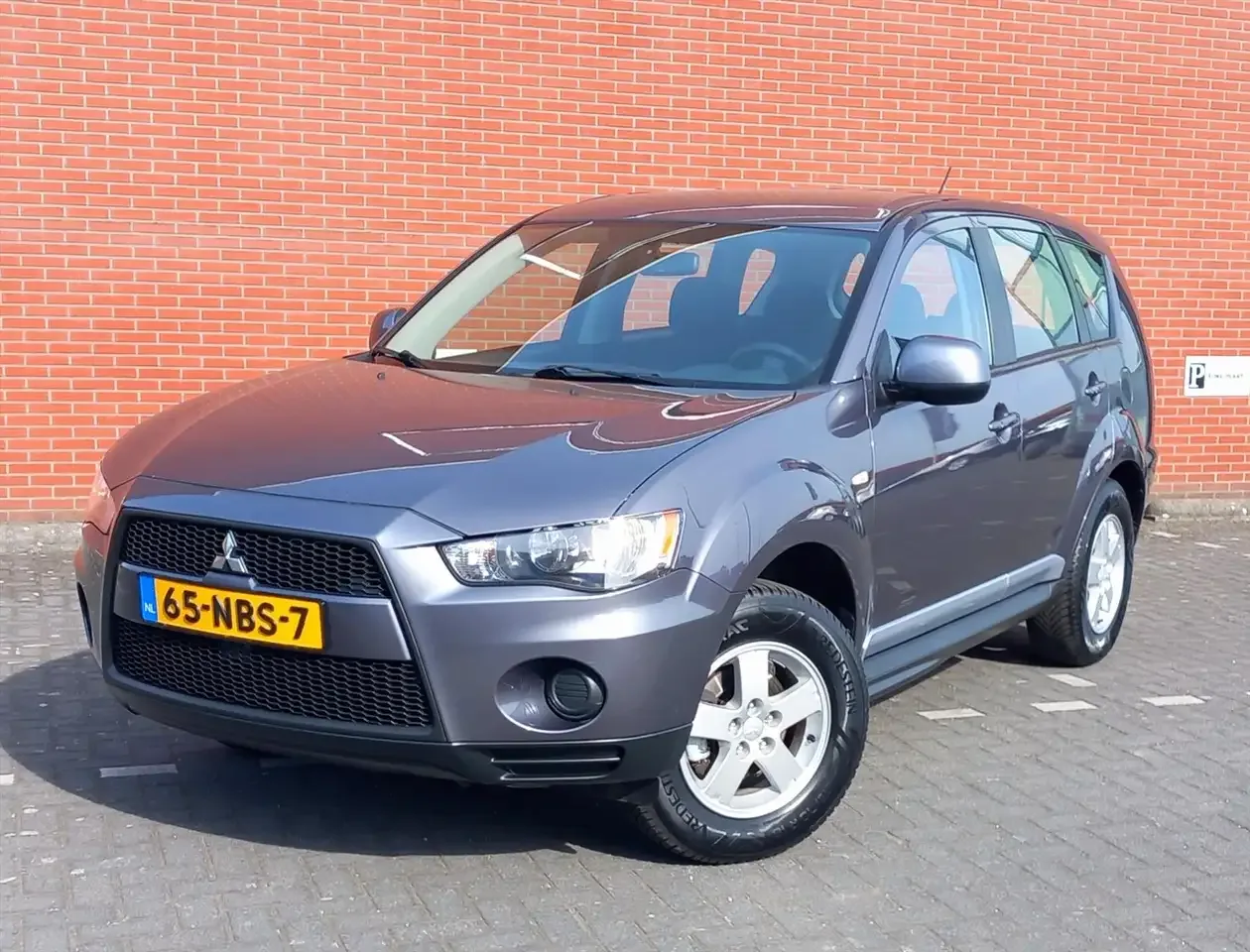 Mitsubishi Outlander (2010) — foto 1