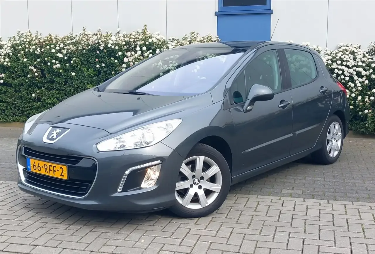 Peugeot 308 (2011) — foto 1