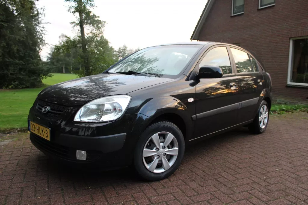 Kia Rio (2009) — foto 1