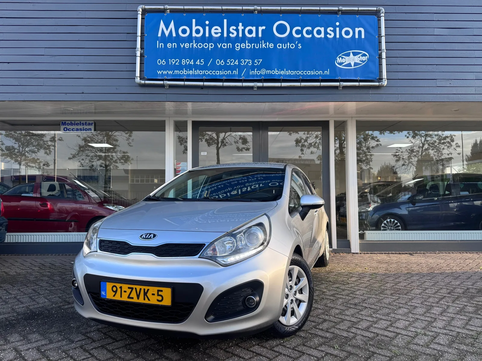 Kia Rio (2013) — foto 1