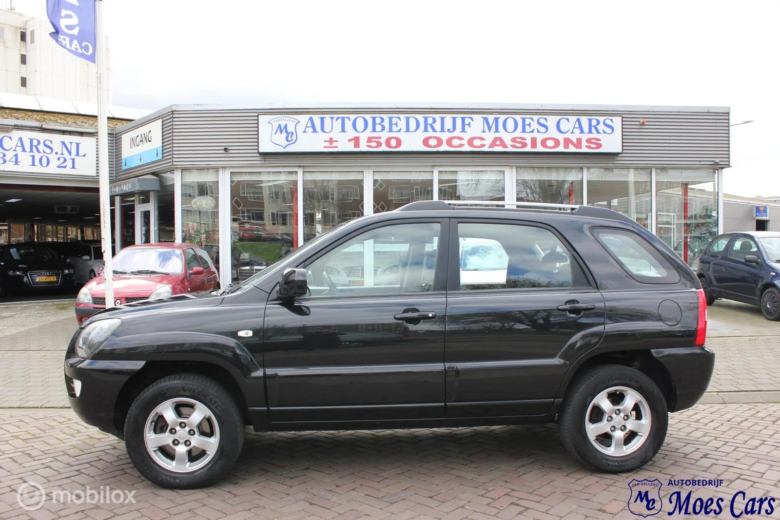 Kia Sportage (2008) — foto 1