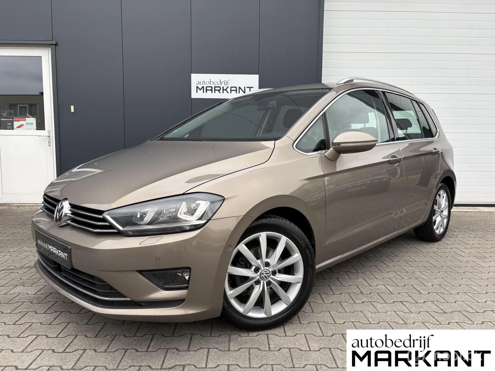 Volkswagen Golf Sportsvan (2014) — foto 1