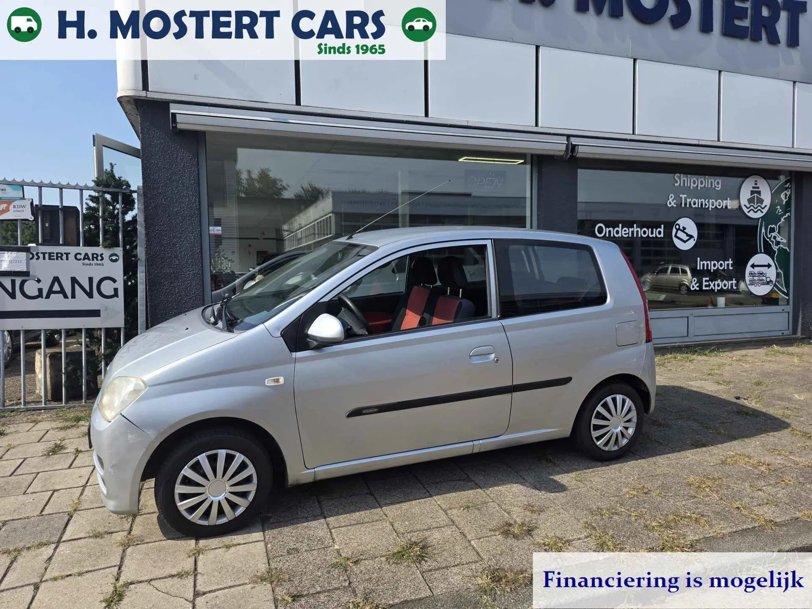 Daihatsu Cuore (2006) — foto 1