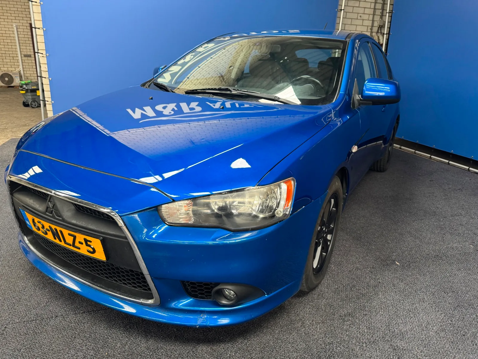 Mitsubishi Lancer (2010) — foto 1