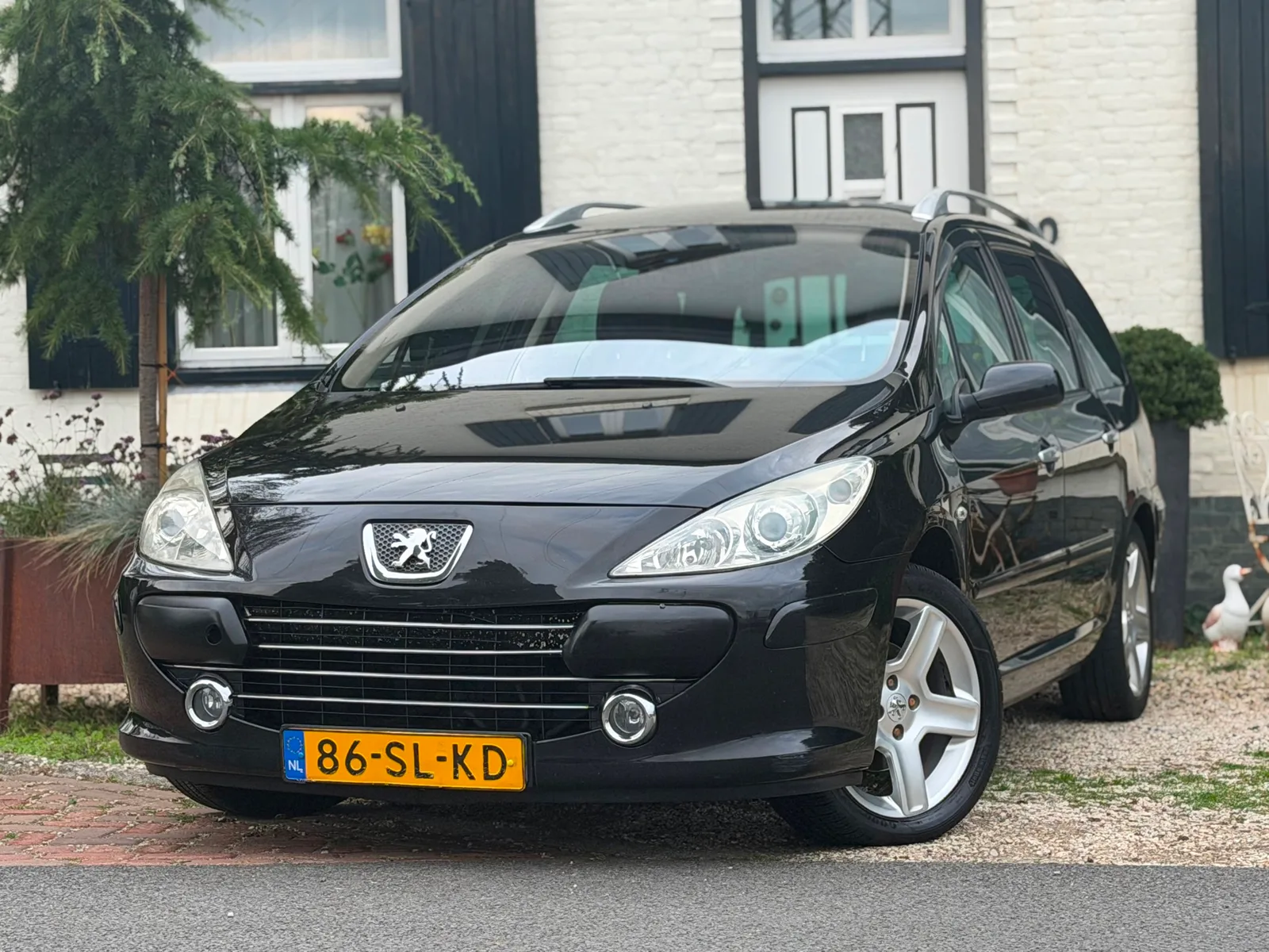 Peugeot 307 SW (2006) — foto 1