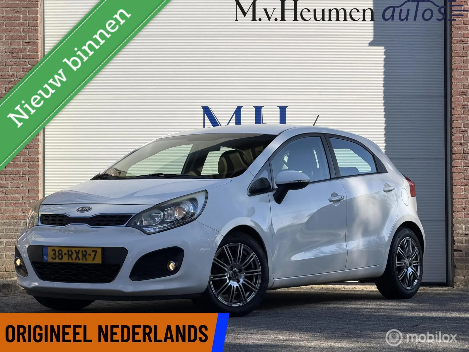Kia Rio (2011) — foto 1