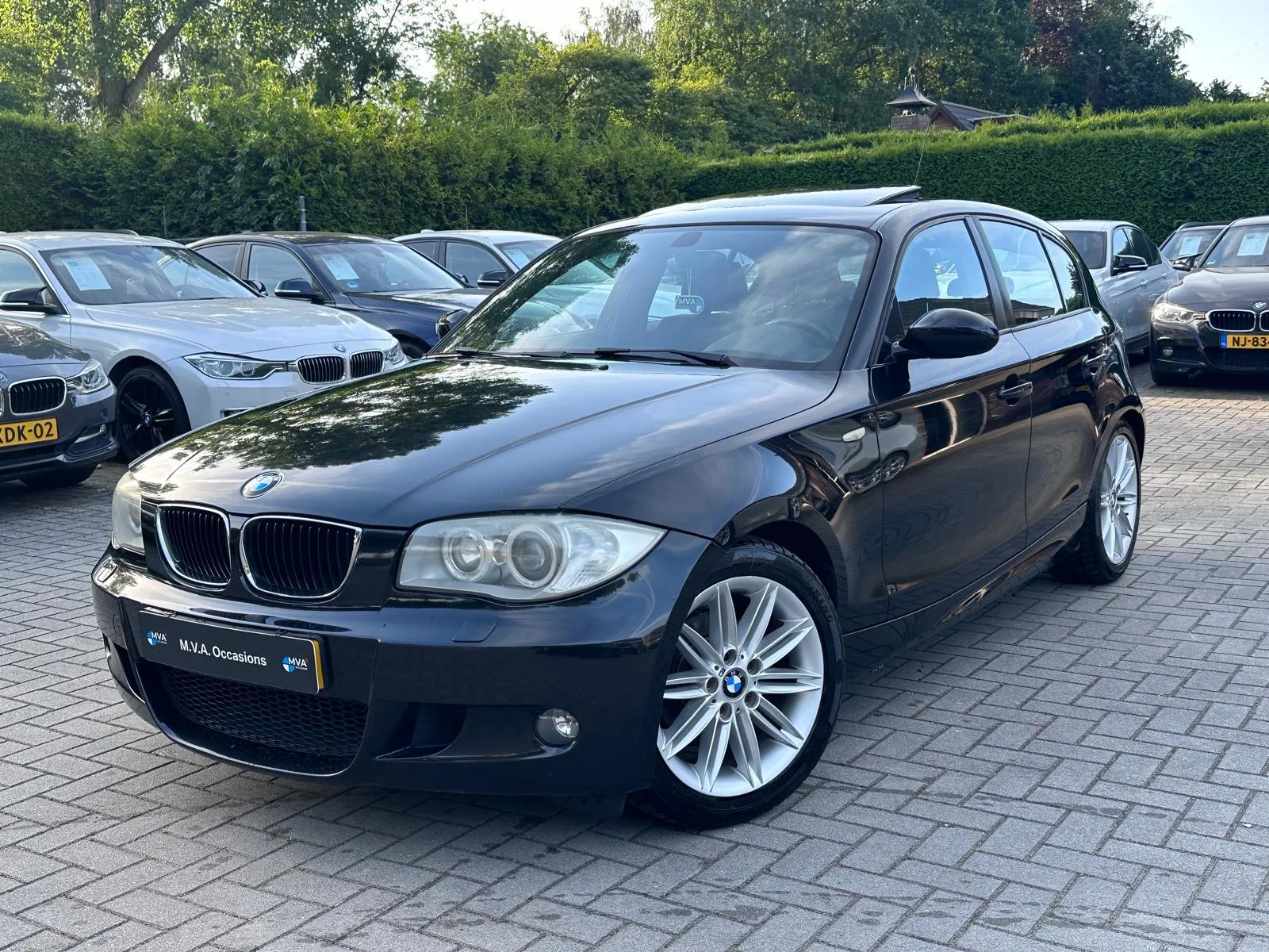 BMW 1-Serie (2006) — foto 1