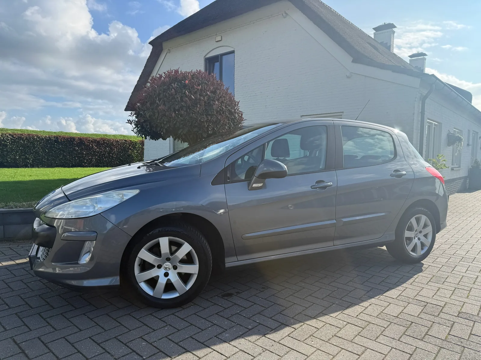 Peugeot 308 (2011) — foto 1