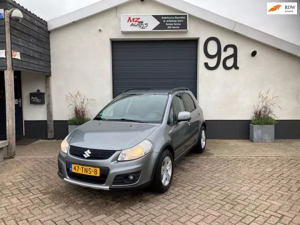 Suzuki SX4 (2012) — foto 1