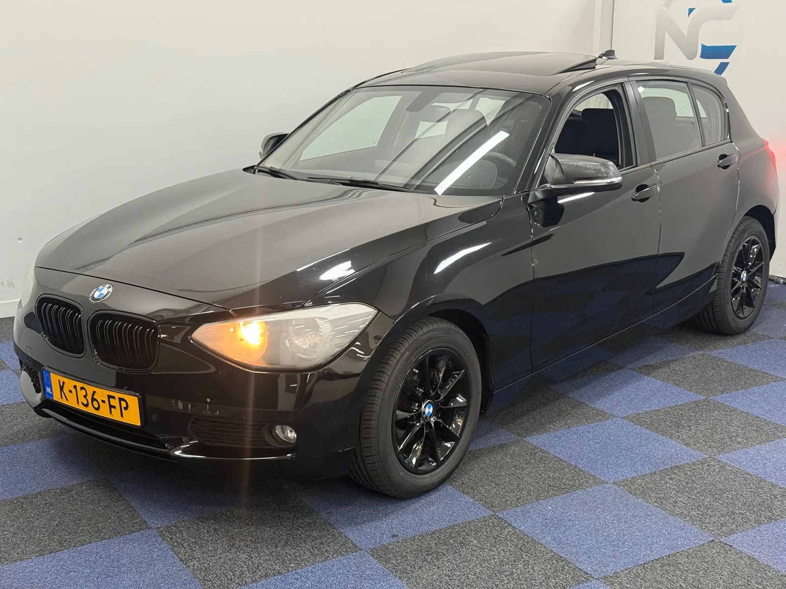 BMW 1-Serie (2011) — foto 1