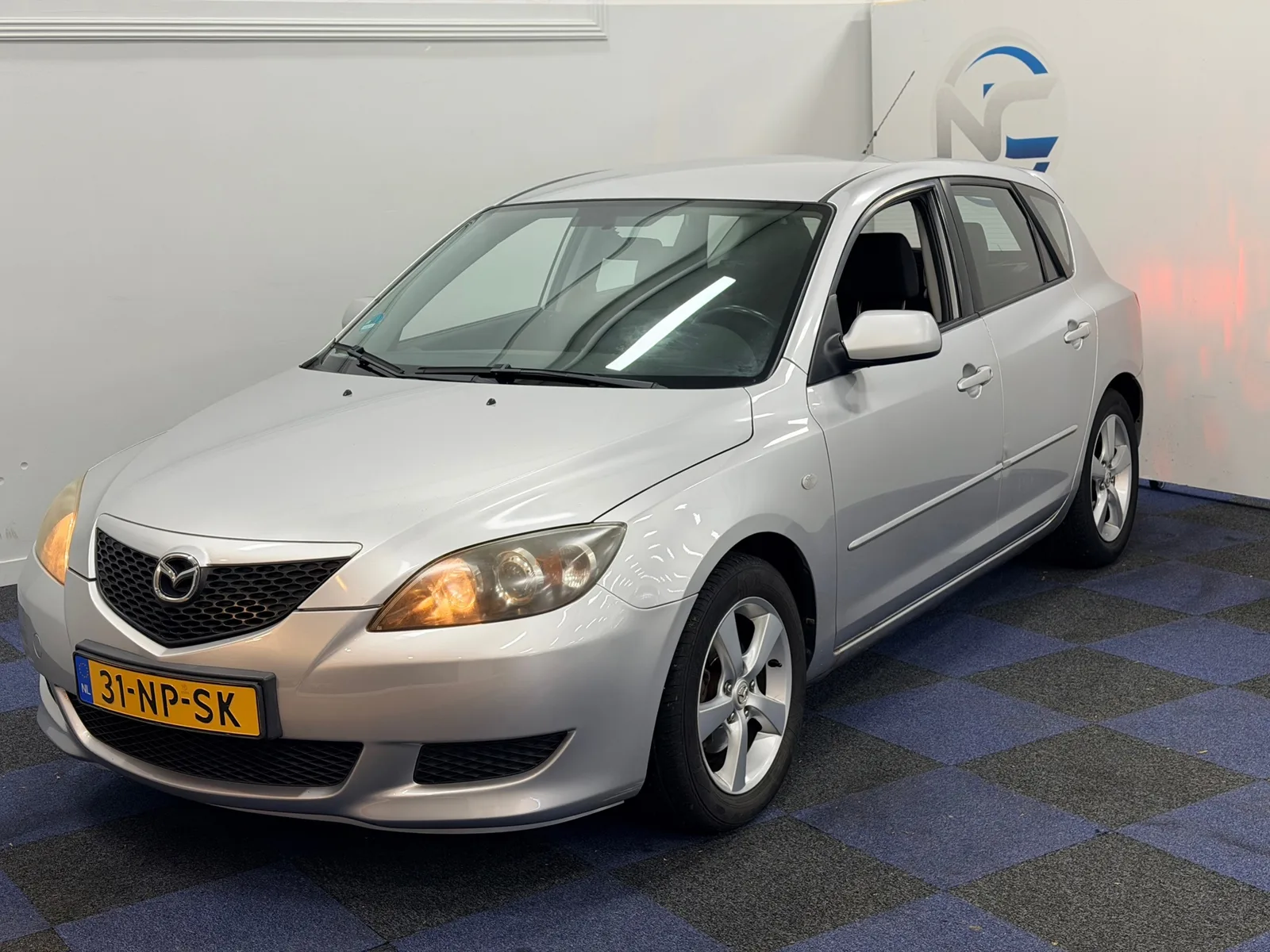 Mazda 3 (2004) — foto 1