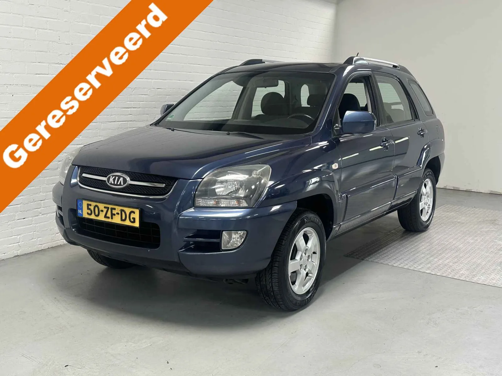 Kia Sportage (2008) — foto 1