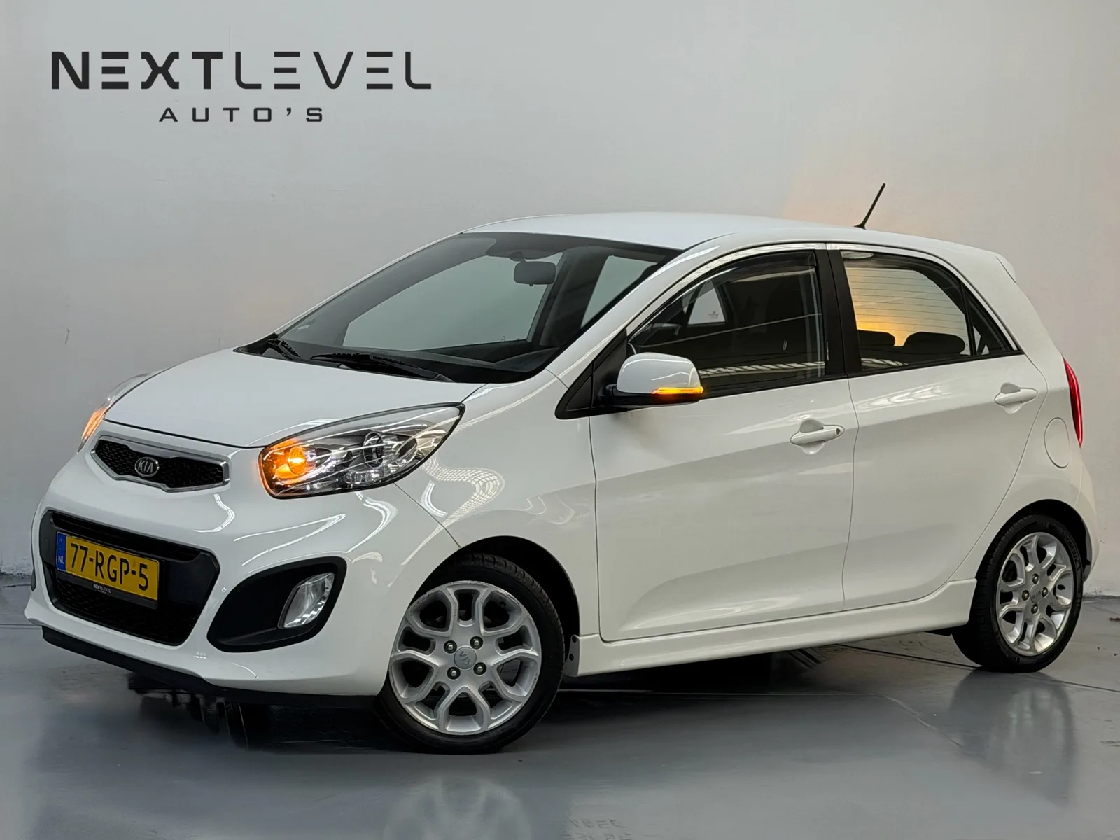 Kia Picanto (2011) — foto 1