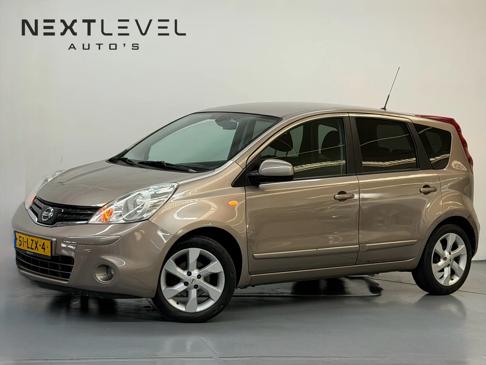 Nissan Note (2010) — foto 1