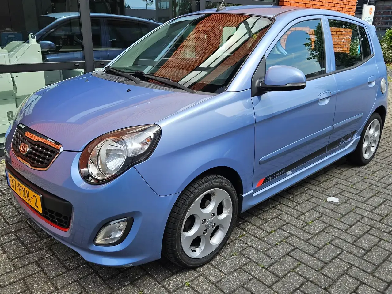 Kia Picanto (2011) — foto 1