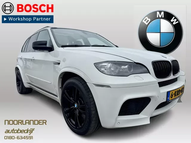 BMW X5 (2010) — foto 1