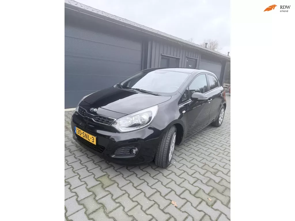 Kia Rio (2011) — foto 1