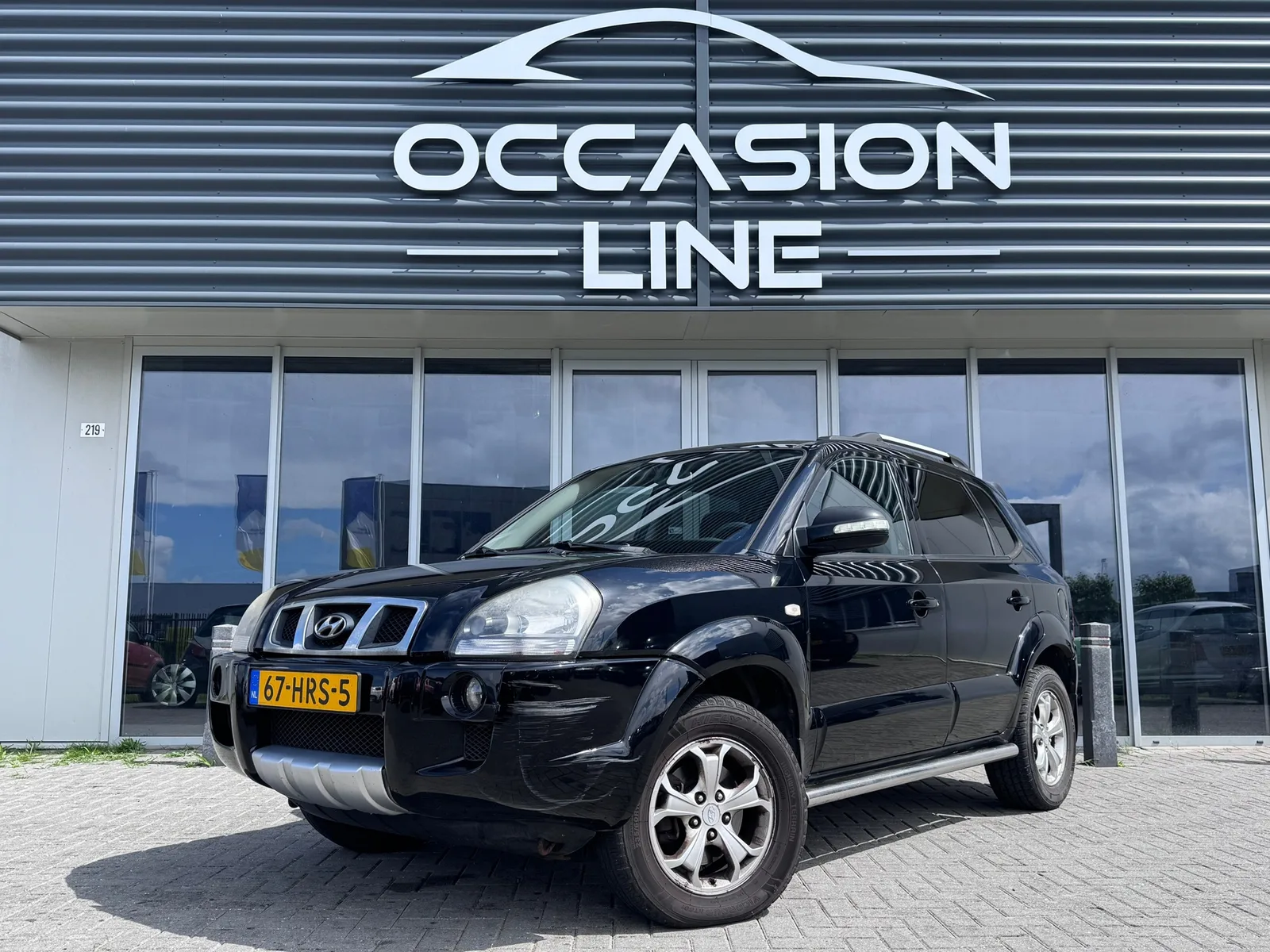 Hyundai Tucson (2009) — foto 1
