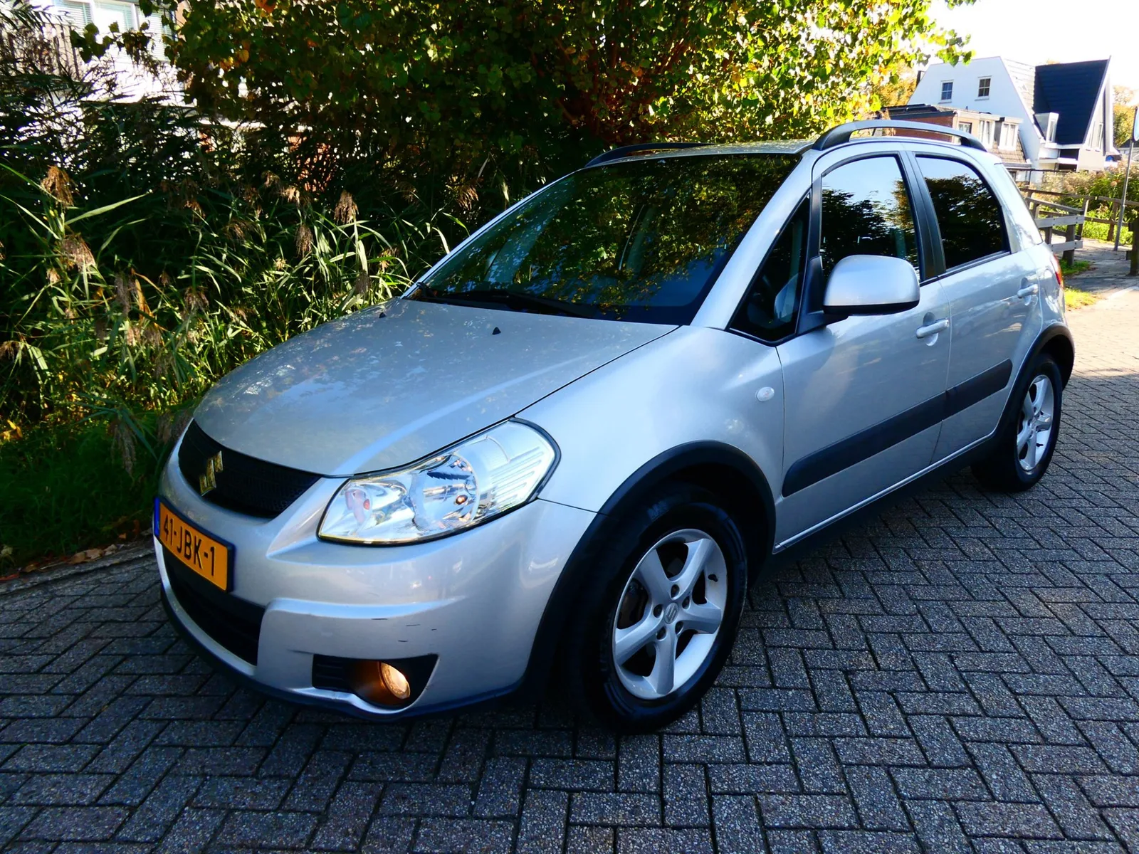 Suzuki SX4 (2009) — foto 1
