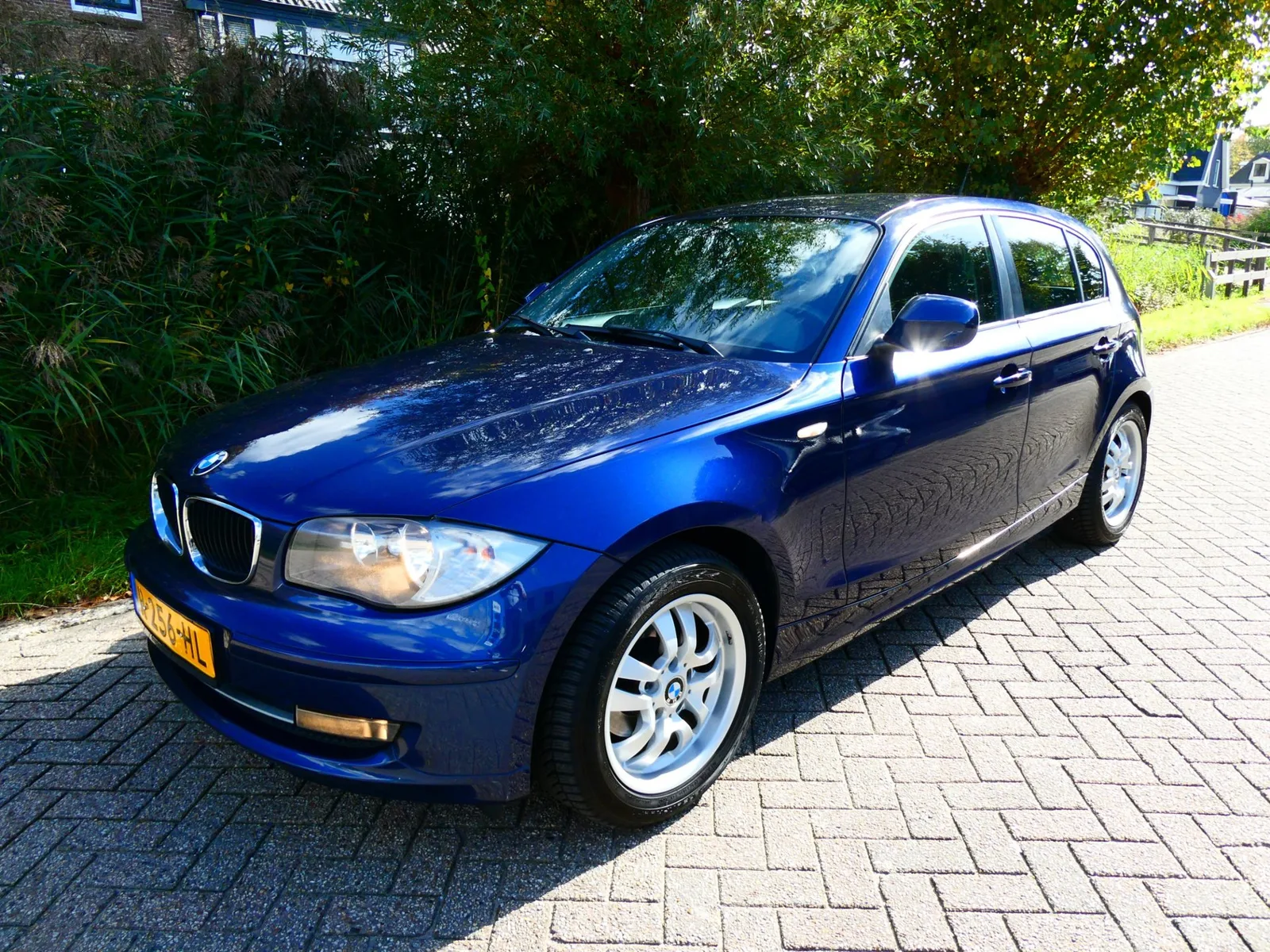 BMW 1-Serie (2009) — foto 1