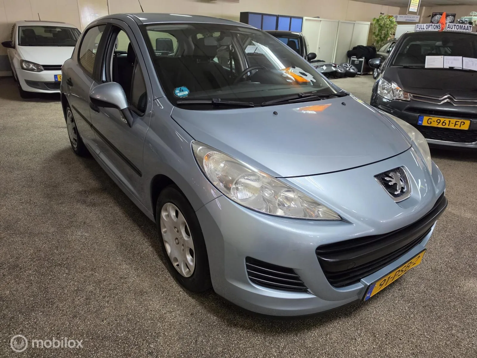 Peugeot 207 (2011) — foto 1
