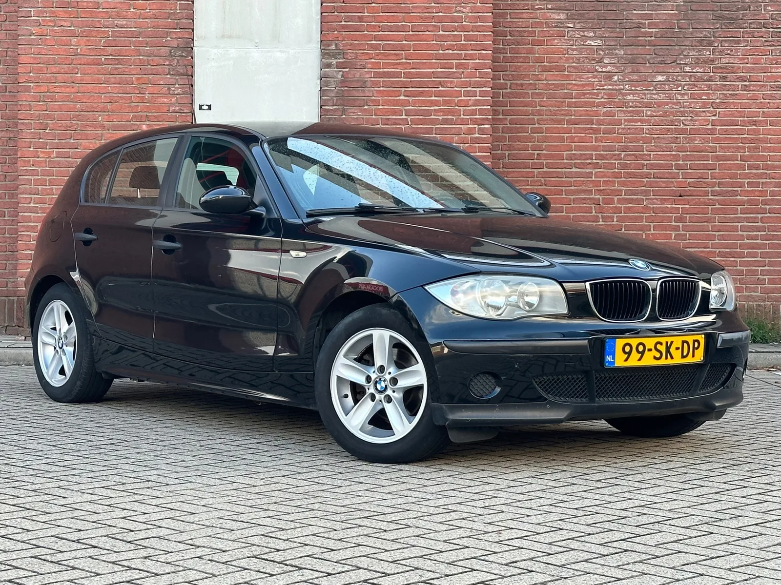 BMW 1-Serie (2006) — foto 1