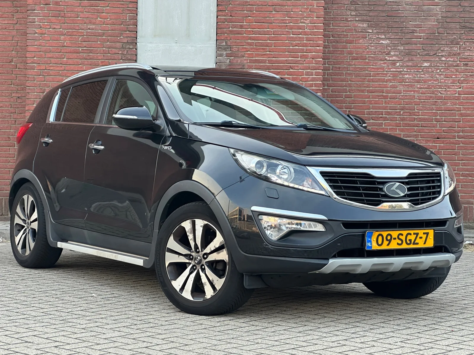 Kia Sportage (2011) — foto 1