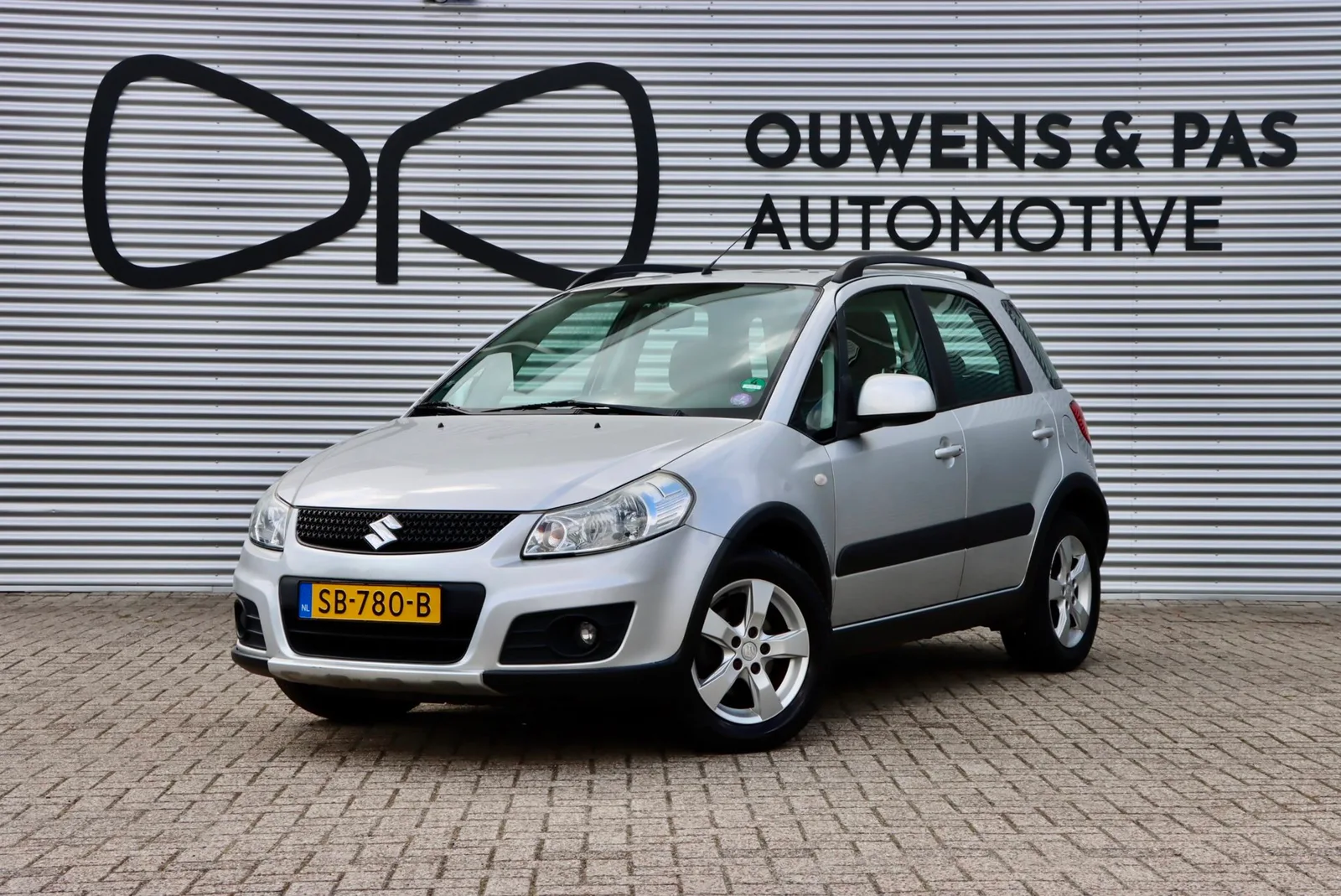 Suzuki SX4 (2012) — foto 1