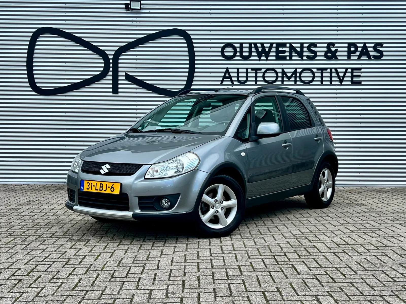 Suzuki SX4 (2006) — foto 1