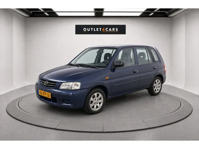 Mazda Demio (2000) — foto 1