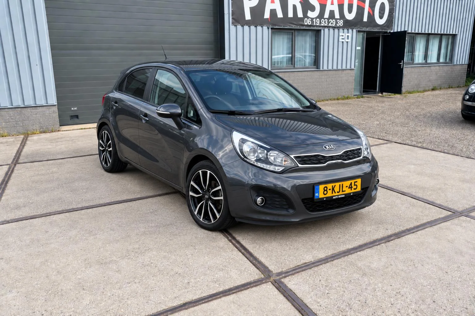 Kia Rio (2013) — foto 1