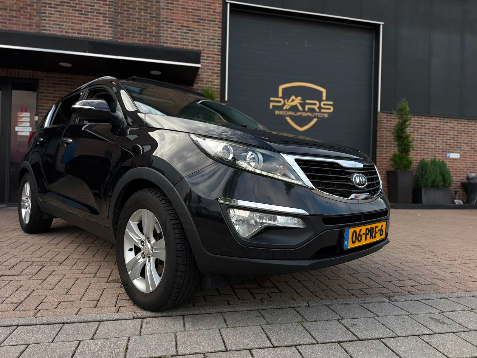 Kia Sportage (2011) — foto 1