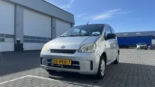 Daihatsu Cuore (2009) — foto 1