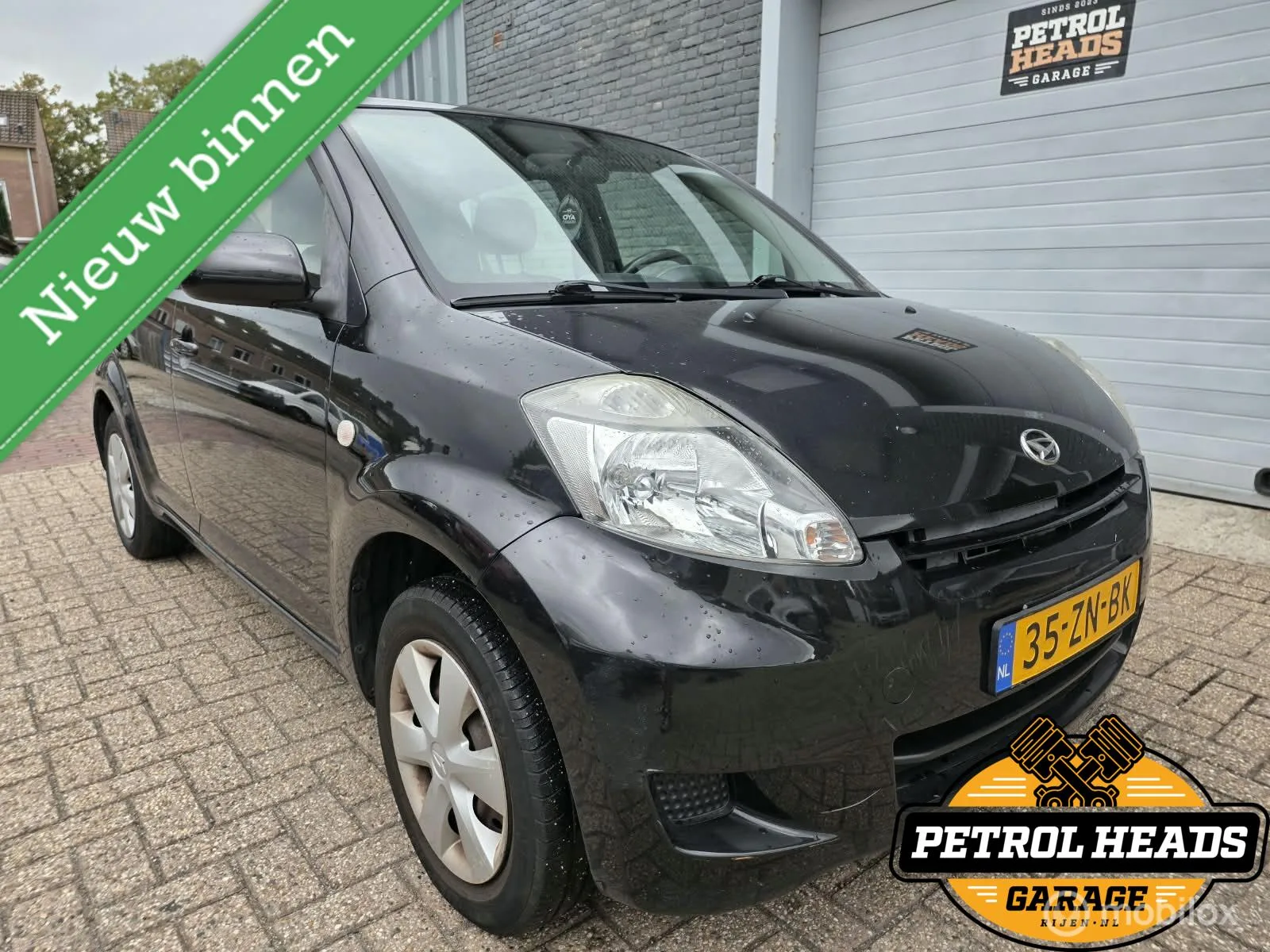 Daihatsu Sirion (2008) — foto 1