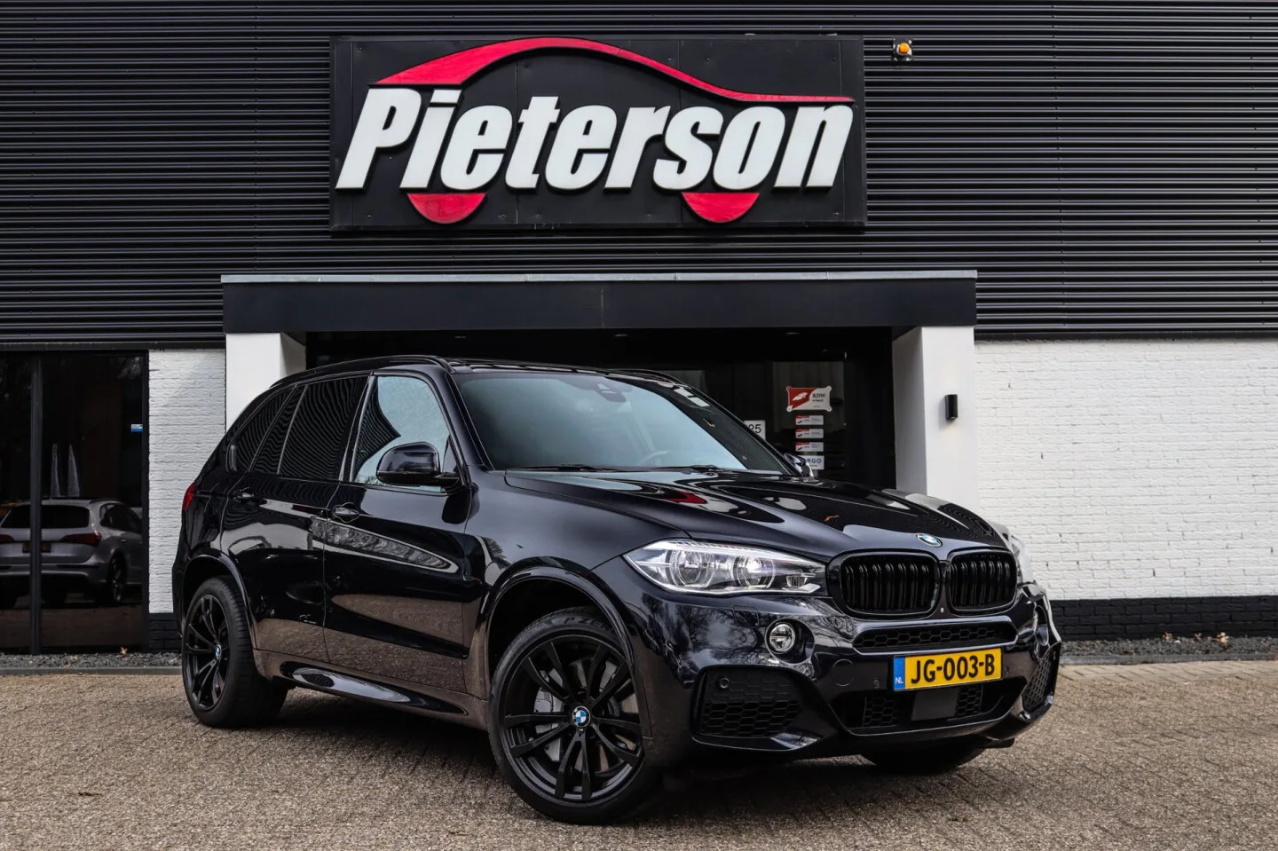 BMW X5 (2014) — foto 1