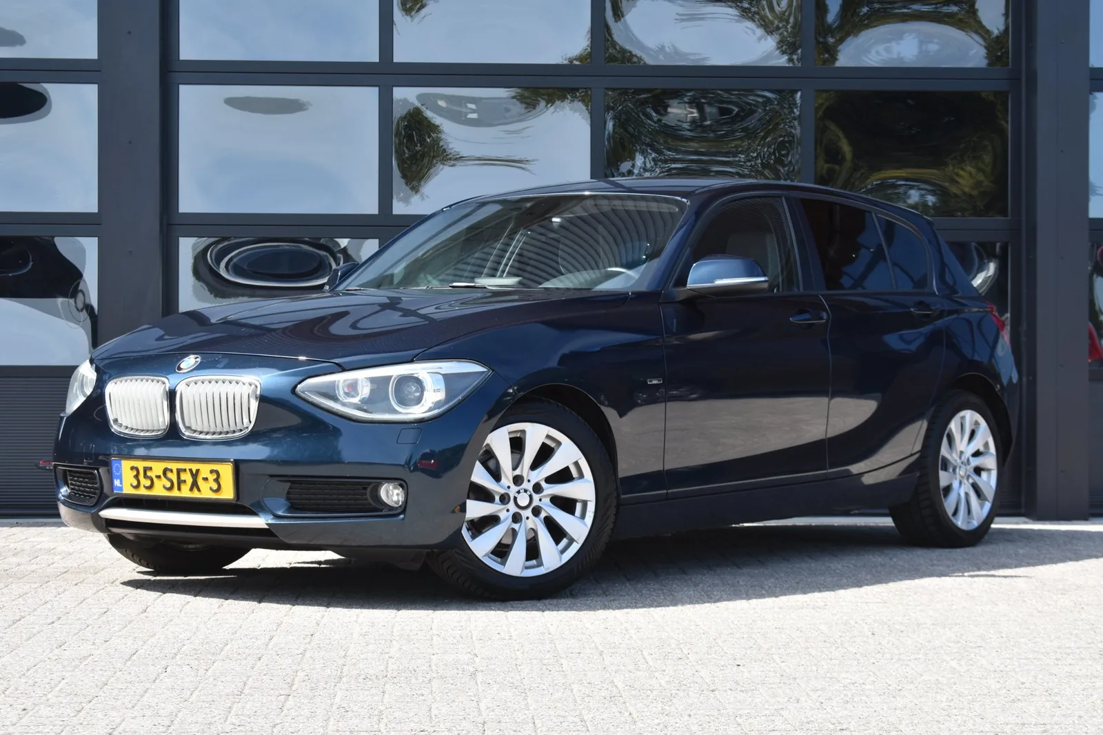 BMW 1-Serie (2011) — foto 1