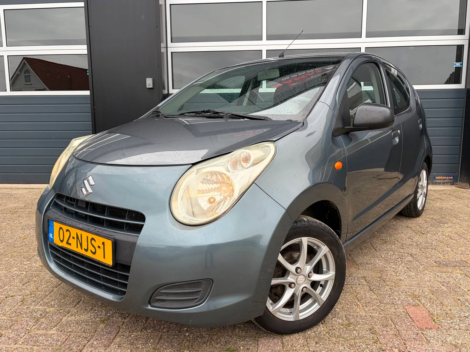 Suzuki Alto (2010) — foto 1