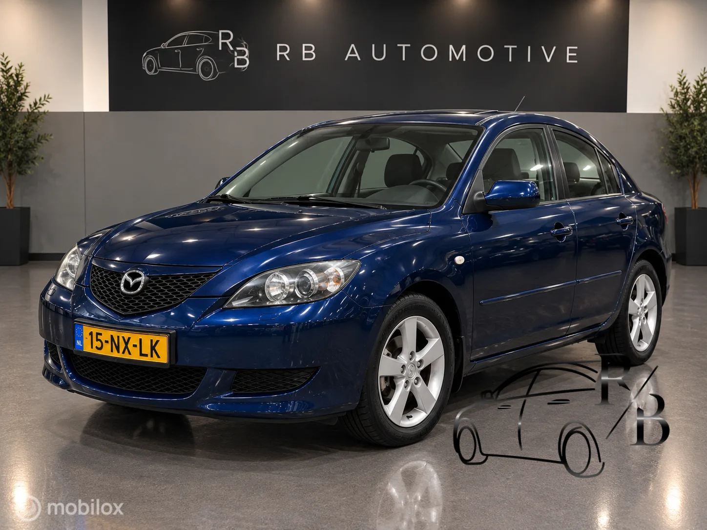 Mazda 3 (2004) — foto 1
