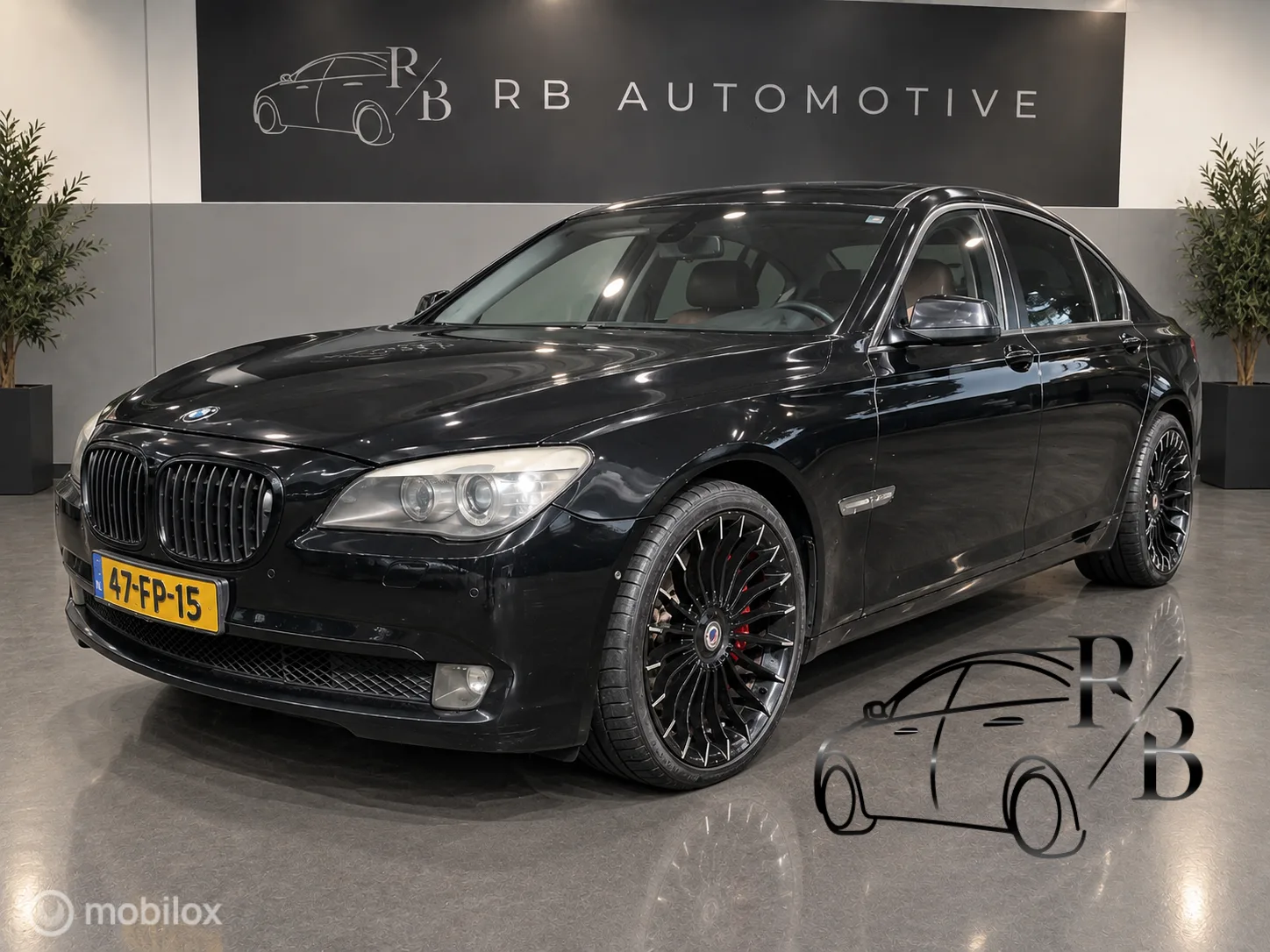 BMW 7-Serie (2009) — foto 1
