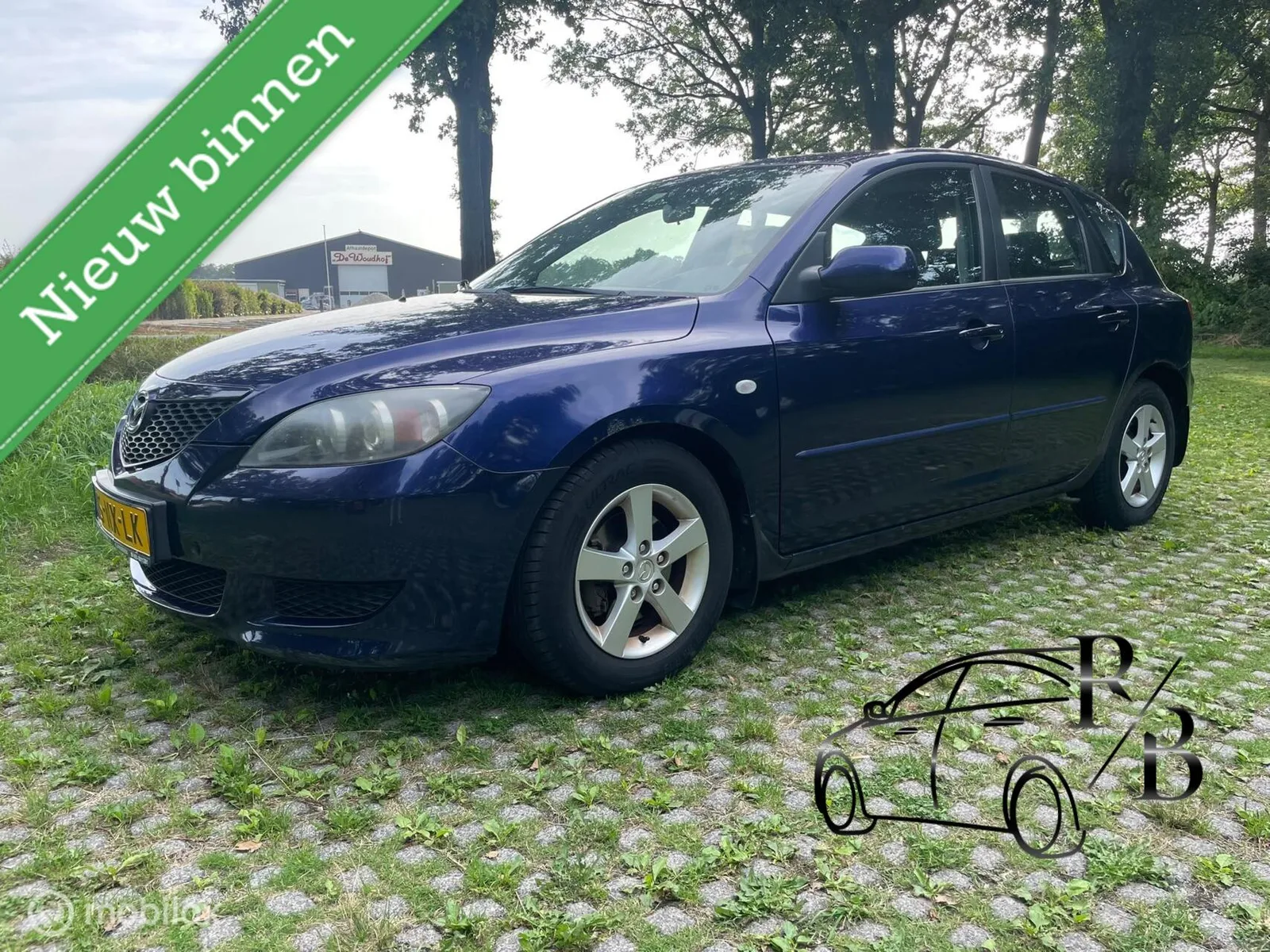 Mazda 3 (2004) — foto 1