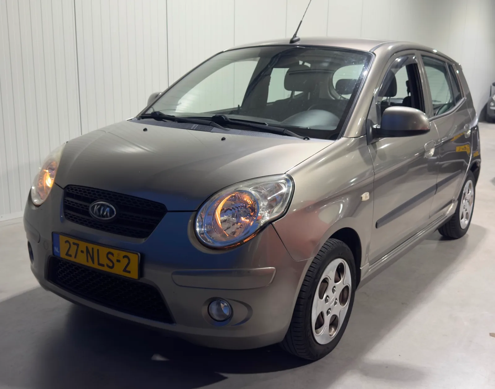 Kia Picanto (2010) — foto 1