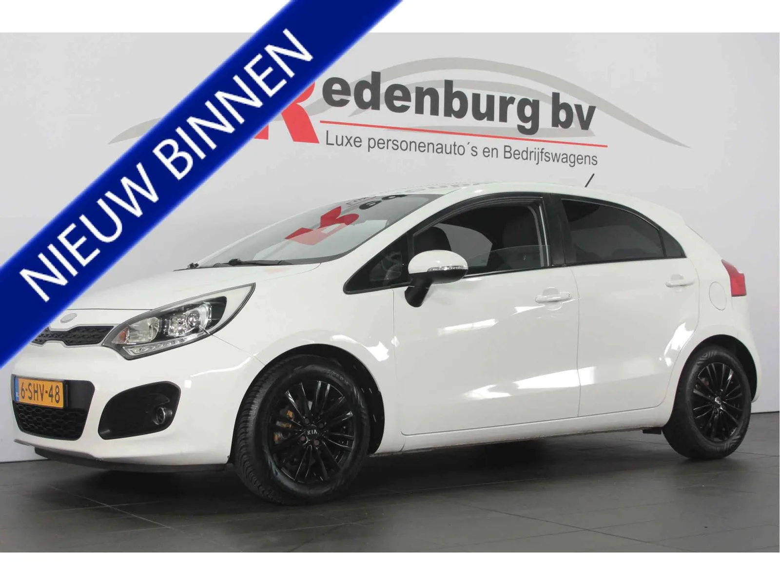 Kia Rio (2013) — foto 1
