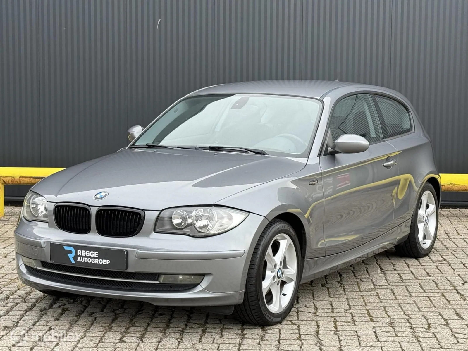 BMW 1-Serie (2009) — foto 1