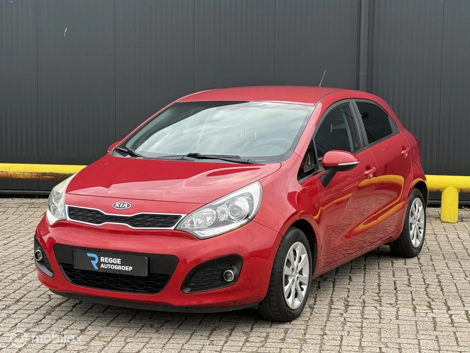 Kia Rio (2012) — foto 1