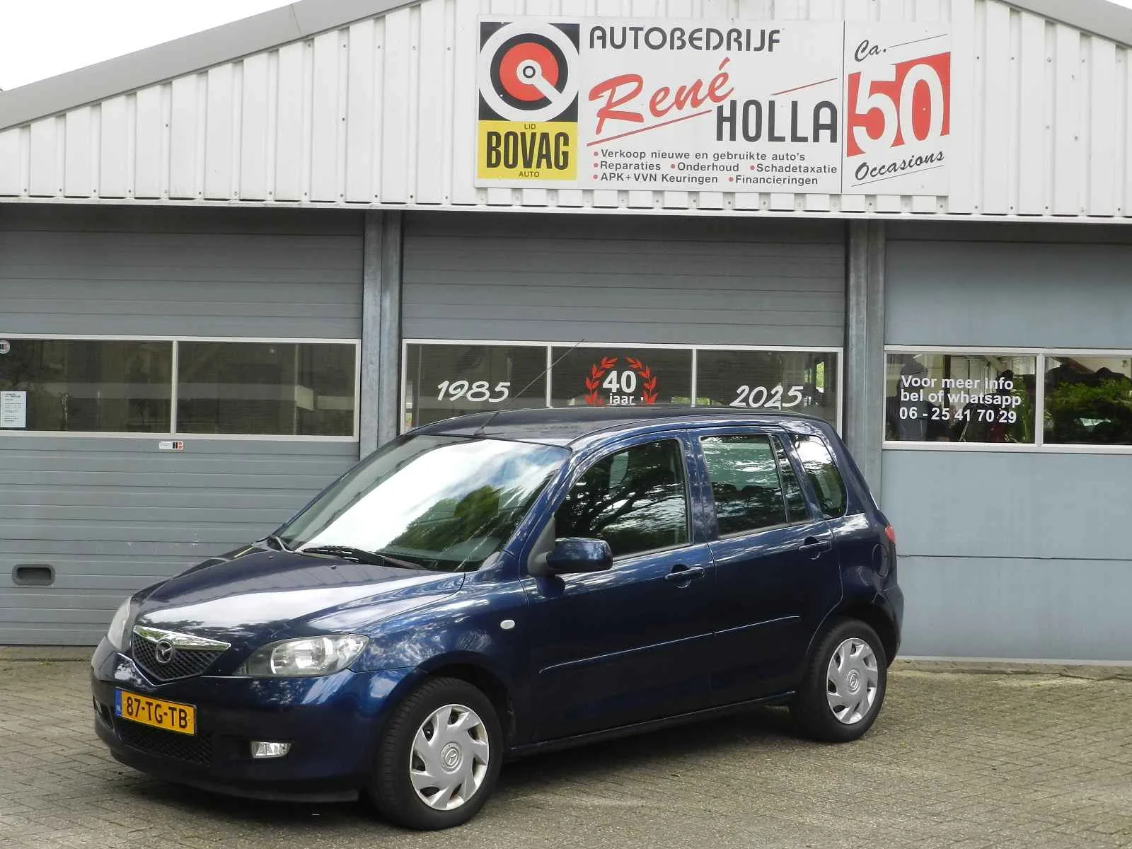 Mazda 2 (2006) — foto 1