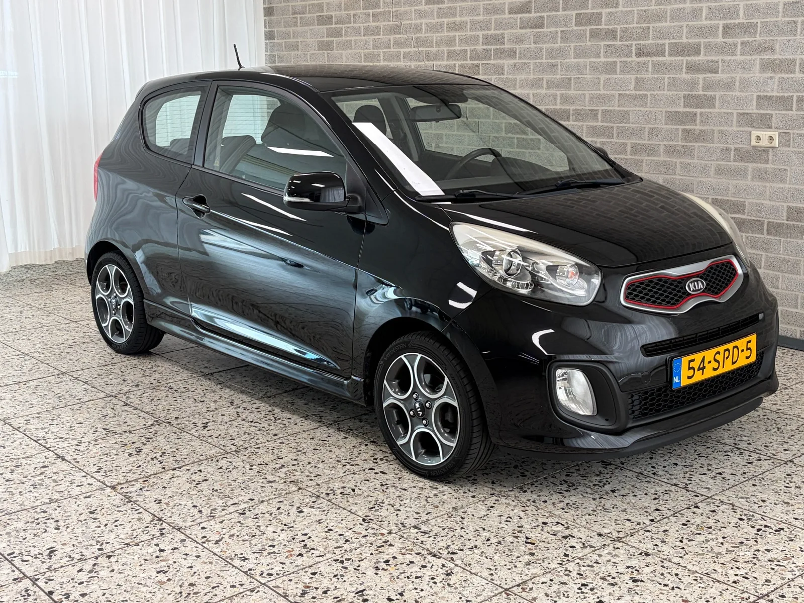 Kia Picanto (2011) — foto 1