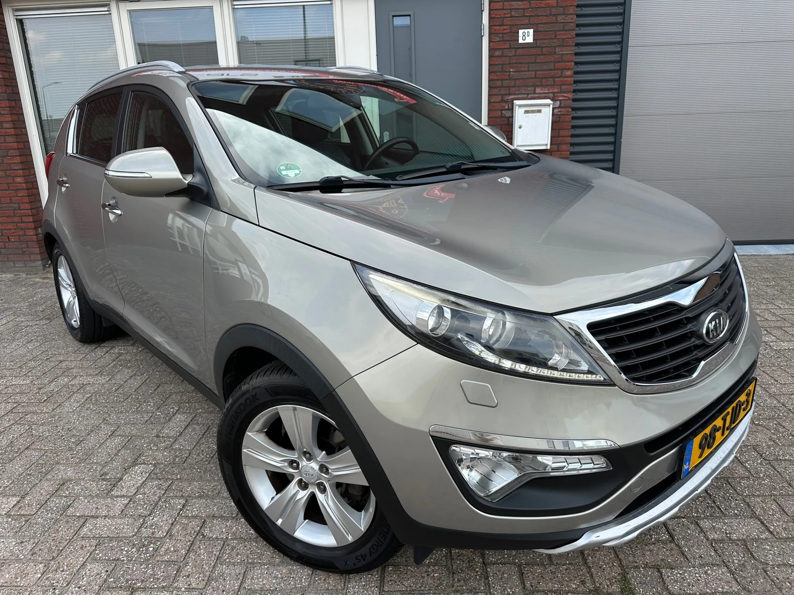 Kia Sportage (2012) — foto 1